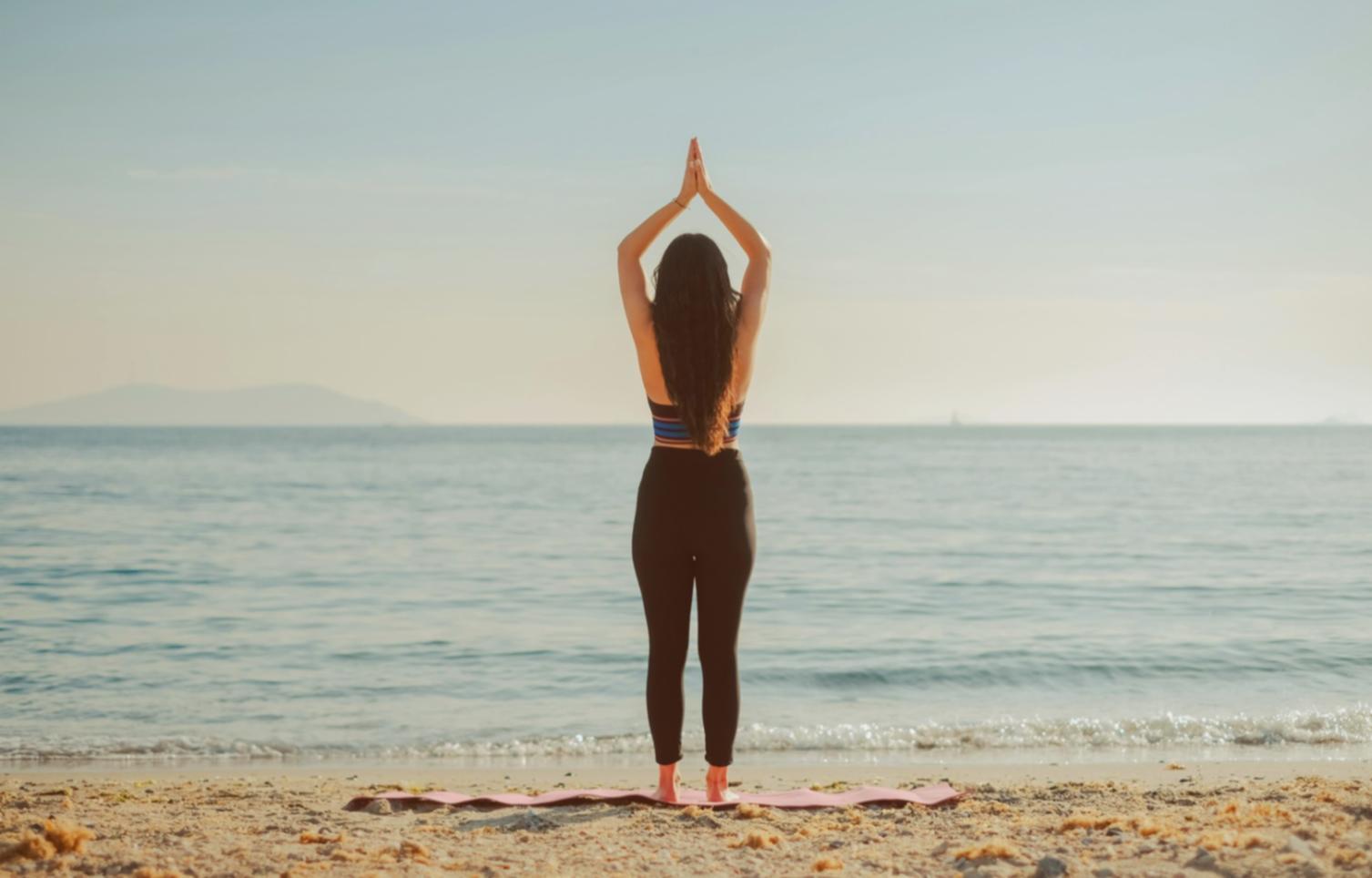 Athlete practicing yoga pose in training environment